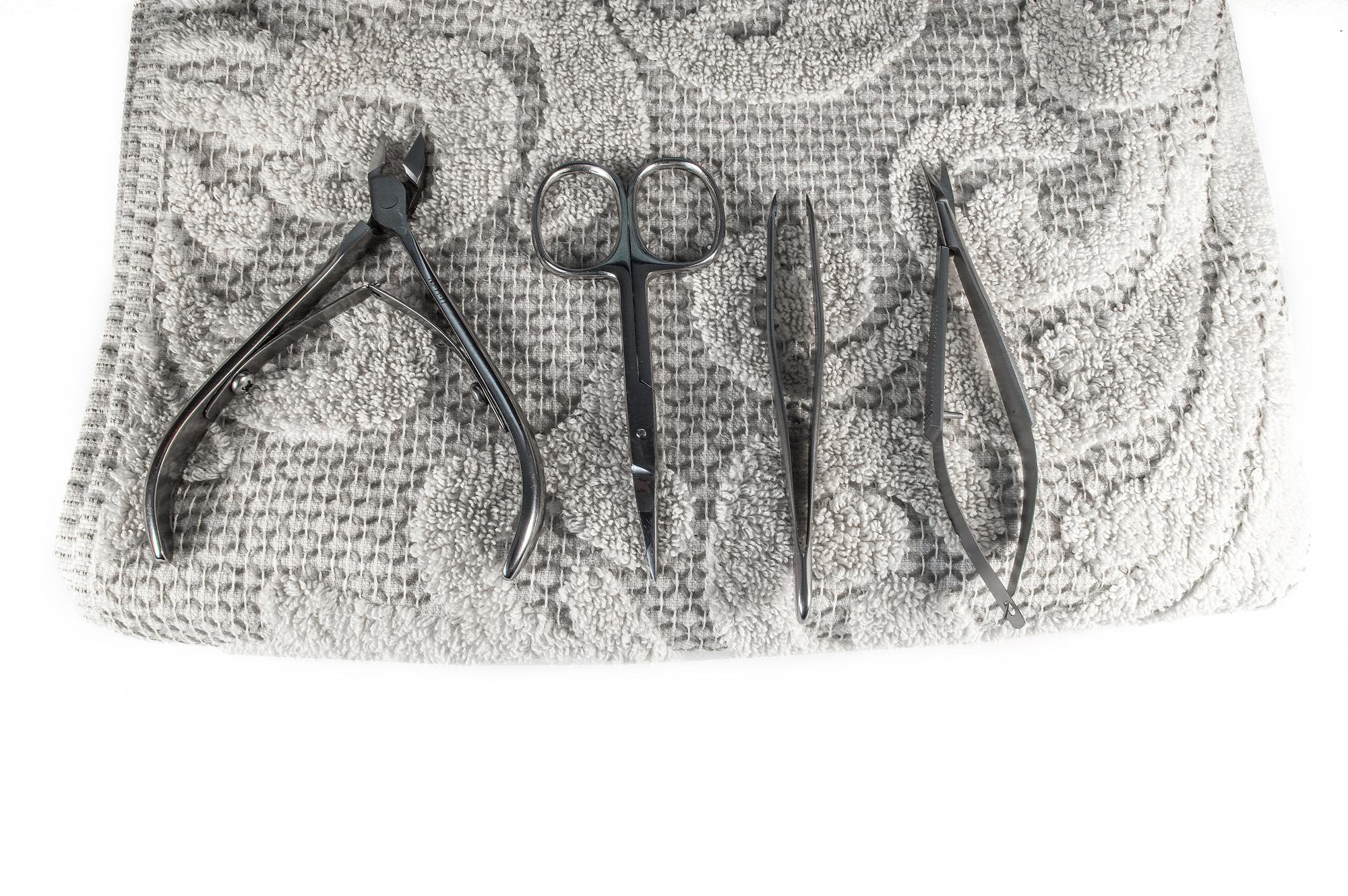 Artist at work stitching a pattern